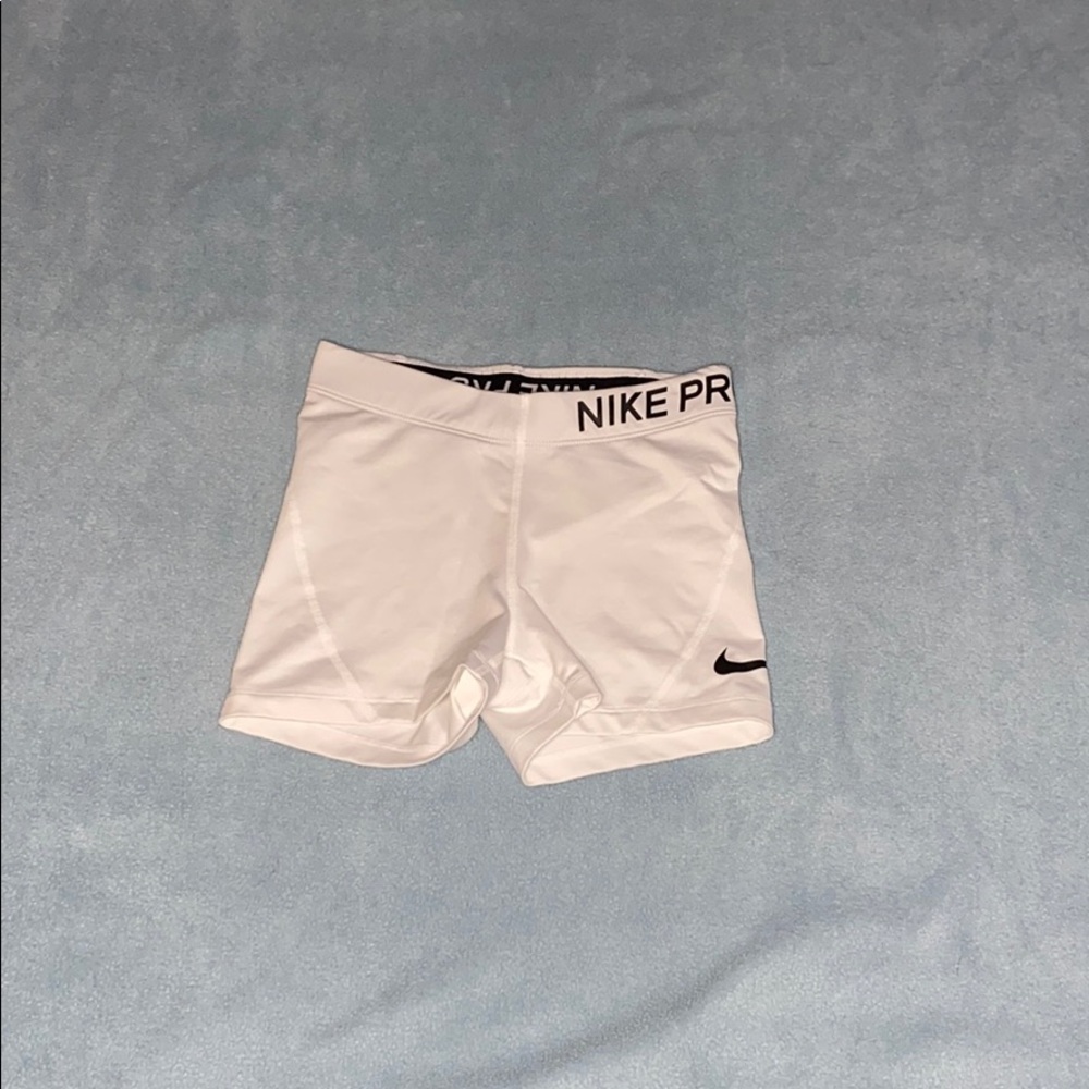 white nike pros xs